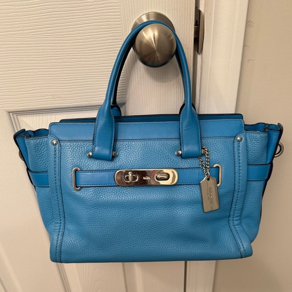 Coach Handbags - Authentic Coach Blue Swagger Bag